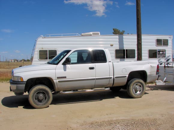 This was my first Dodge. I towed a u-haul trailer with a mustang back from Las Vegas and decided I NEEDED a manual transmission. Never towed the WW behind it (in the picture). That 4 speed auto sucked. Really high stall speed and wouldn't stay locked if I got on it hard in 4th. I hated it. The truck was great though. Did the same 4900 mile trip but no trailer and averaged 22 mpg. if it had had the 6 speed I'd still be driving it.