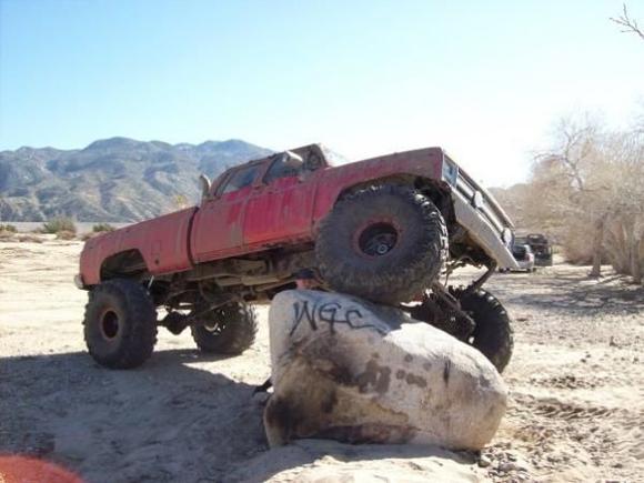 Flexing up on a big ass rock