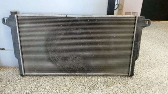 Dirty radiator removed at about 160,000 miles. Breather bottles had been relocated at 70,000 miles and 12 years before.