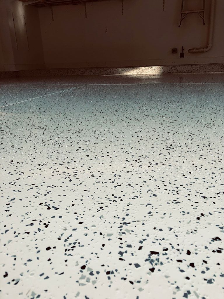 Bubbles in finished garage Epoxy floor? Is this normal? - DoItYourself