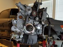 After bolting on a new water pump, balance shaft sprocket spacer, trigger plate, crank gear, cylinder block bracket, ac bracket, and power steering bracket.