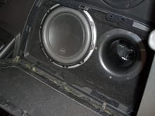 This is 1 of the 2 JL Audio Subs, the other one was in the same place but behind the passenger seat.