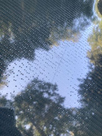 These are the hard “bubbles”. A guy at a local performance shop told me VIS doesn’t clear coat but they place some “gel” over the top. I am wondering if the previous owner clear coated it poorly??