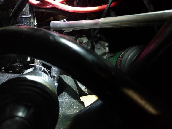 Just enough room to tighten a 2" to 3" hose clamp down on the tie rod boot.  Makes the job a lot easier.