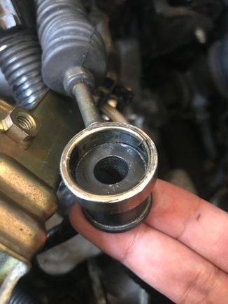 Shifter bushing diameter is too big and doesn't allow cable to go over it. I'd have to press it in.