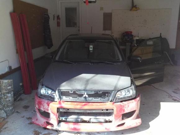 Got a free c-west replica kit from a guy who no longer owned his Evo...decided to do some fabrication work on it. Maybe it will be my future bumper it can get it to fit completely.