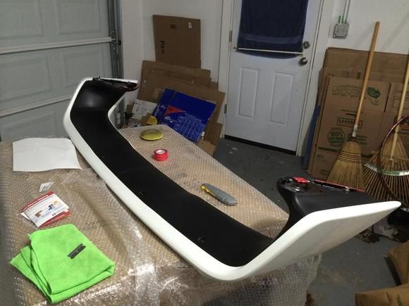 Applied Wolfgang Trim Sealant to the black plastic.  This stuff works incredible.  Doesn't take much to spread it on the area needed and doesn't wash off in the rain.