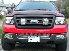 Kevin's F-150 Hella Grill and HID's with Halos
