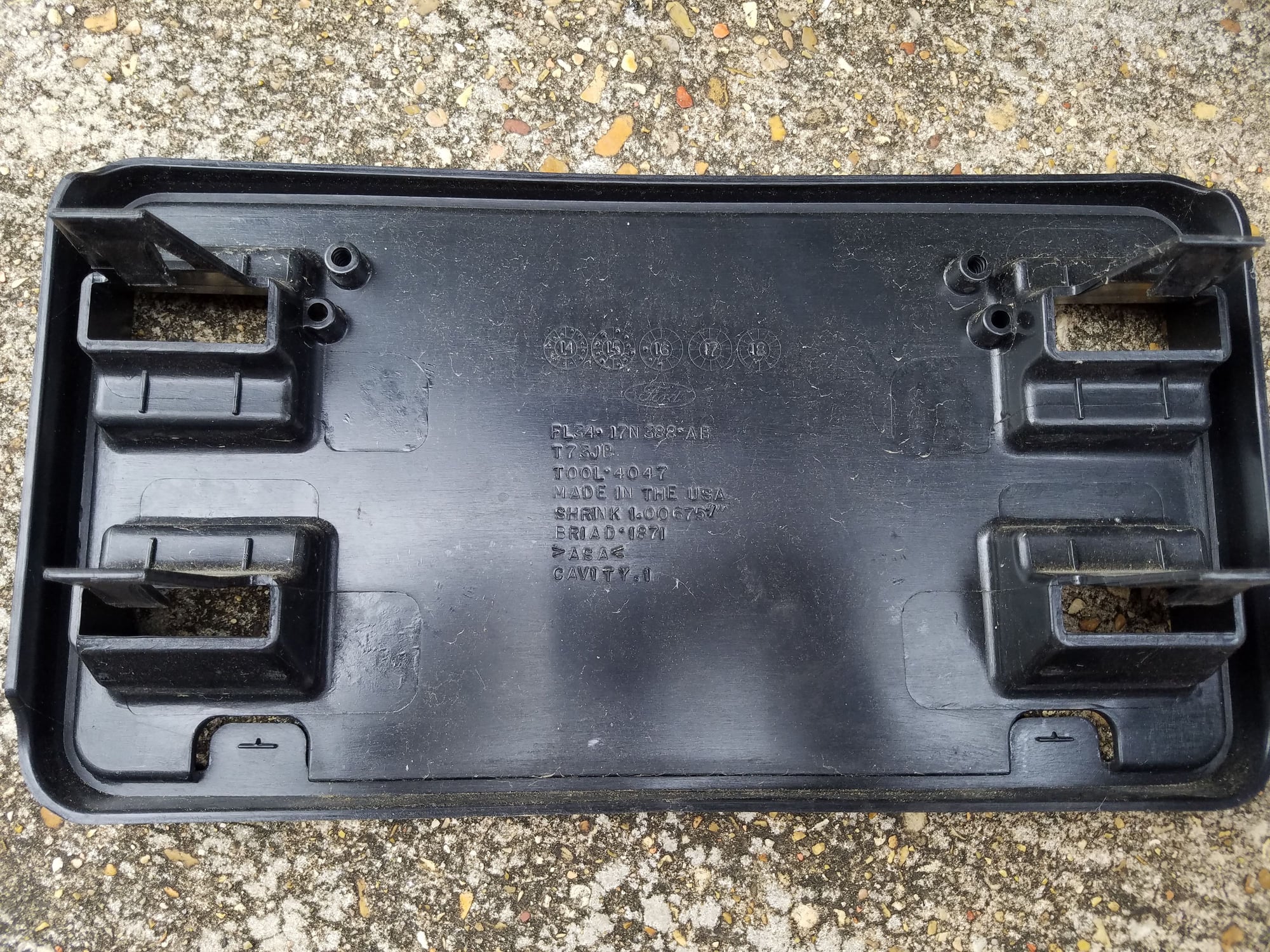 how to remove front license plate bracket f150