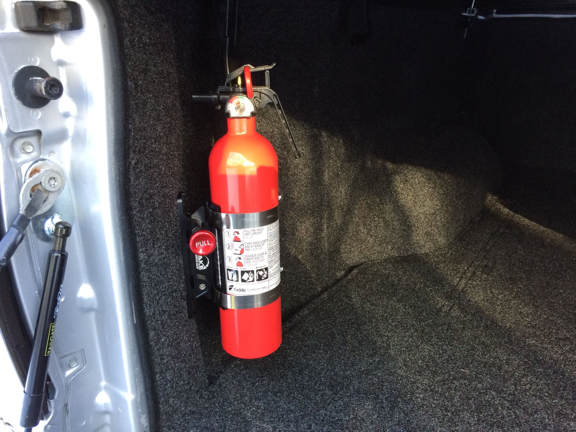 Mounting fire extinguisher truck cap? - YotaTech Forums