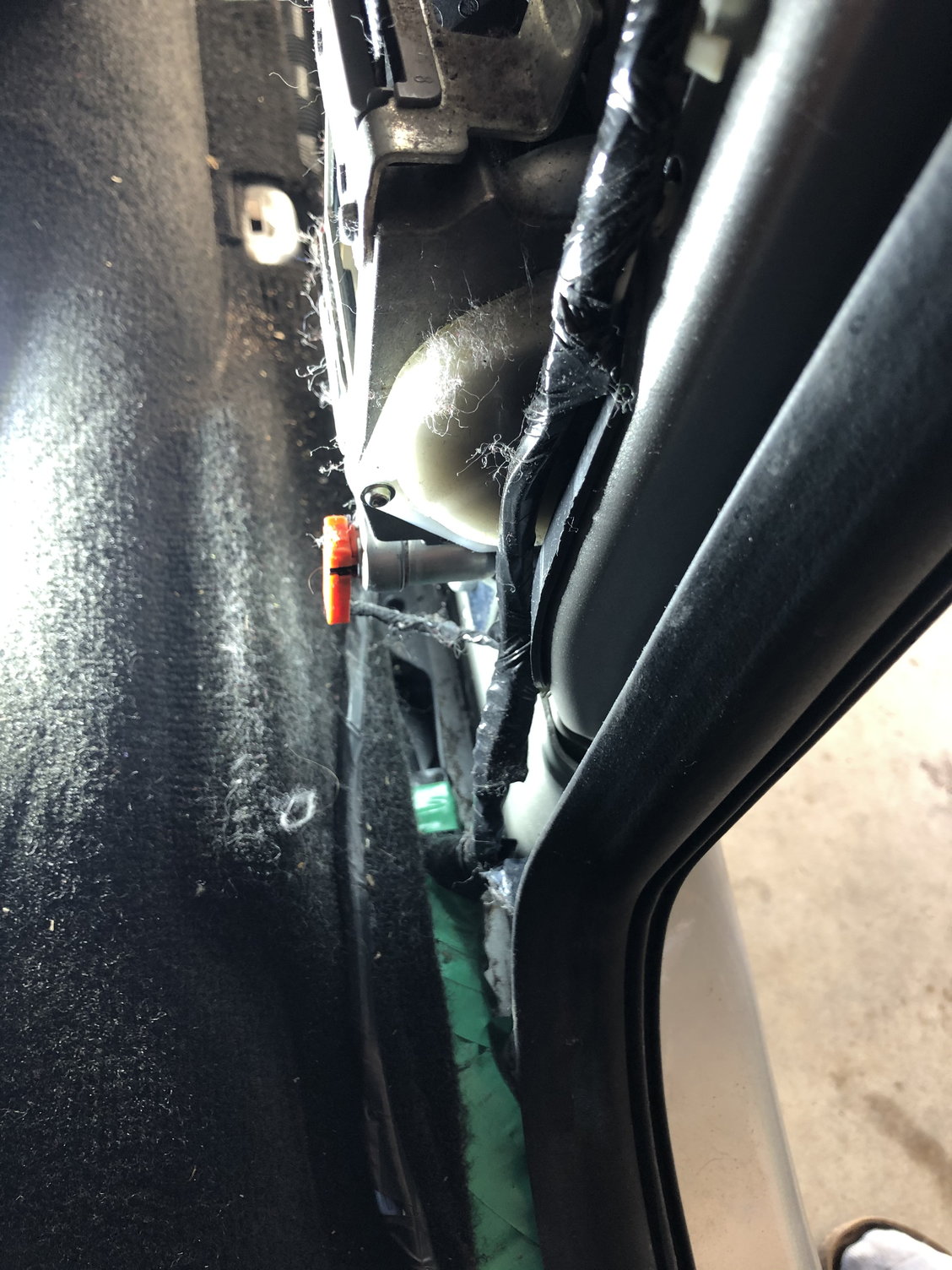 Rear drivers side door won't lock or unlock - no wiring harness plug