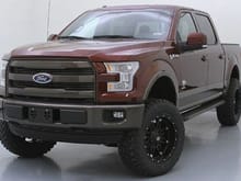 Bronze Fire lifted King Ranch w/ custom Caribou paint over the grille and bumpers