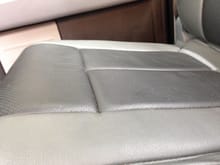 Passenger side rear seat.  Still looks good, but I'm starting to see the same white fibers as the middle rear seat.