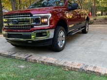 Debating on whether or not to get rid to the chrome grill and get a take-off ruby red lariat grill.