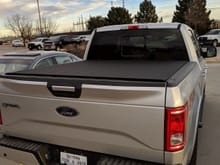 Like the tonneau cover - the low profile and fabric look awesome on the truck.