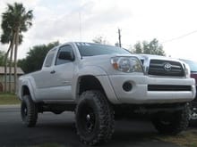 my 3rd truck - 05 tacoma put a 3'' leveling kit and 3'' body lift and 34 swampers- sold it