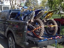 My `06 YZ450F with my buddies mint `99 RM125 in back ready to head to Dyracuse Park, WI for a day of track and trails!