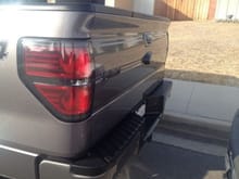 Rear lights edge blacked out. Plastidipped emblem.