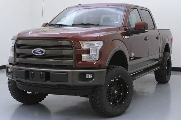 Bronze Fire lifted King Ranch w/ custom Caribou paint over the grille and bumpers