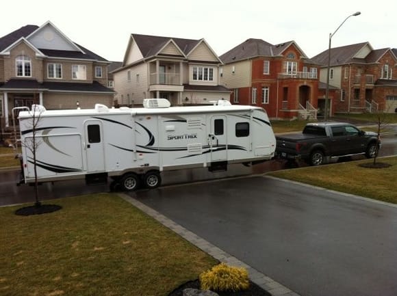 The new Sport Trek 320 VIK.  A lot bigger, and heavier!!!!  Thanks to Fred, we can now pull a much larger trailer!!!