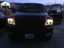 Spyder Projection Smoked "Halo" Headlights, Matching Taillights.  Option Racing Grille, Plasti-Dipped Wheels & Emblems.