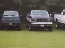 Ford Family older picture (left to right) dad's 02 ranger (sold), my 93 ranger (sold), uncles 98 f350 powerstroke, cousins custom truck 77 f250 frame, 90's body, 460 big block ford (sold)