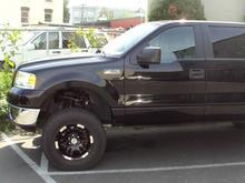 Zone offroad 4" Lift kit. Bilstein 4-6" adjustable struts, Pro Comp 4" Block, 285/70/17 BFG ATs, MotoMetal 951 17x9's 4.5" backspacing -12 offset.