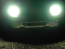 believe it or not, these are the halos only with the truck off which they stay the same with the truck on. i had them on a bit so they are warmed up and at their brightest. it looks like the headlights are on but they arent. also the halos are around the headlight but they were so bright that my digital camera glared really bad. in person they are just bright rings. on camera it looks like headlights. i will have to do it when the sun is going down so the camera doesnt have to adjust from black to white.