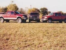 On the far left before build. Had 5" lift and 35's. Truck on the far right is next, getting 54" Boggers.