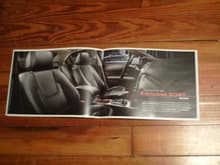 Brochure About the 2009 Ford Fusion, open to the interior page. (I'd love those seats in my truck...)