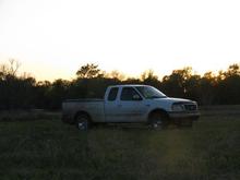 sun setting on the pond