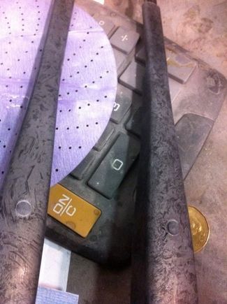 Wiper arms with marbleizing