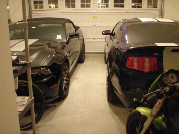My 2010 Shelby GT500 coupe and my buddy/co-worker's 2010 Shelby GT500 convertible both parked in my garage