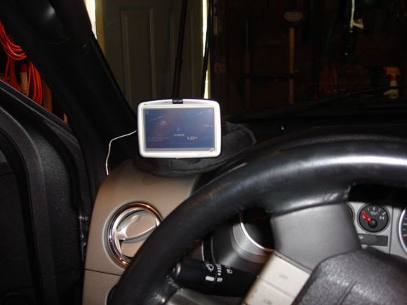 GPS Mount location

I like it over here because it doesn't take up windshield space.  The wires are run under the dash.