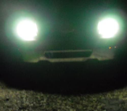 believe it or not, these are the halos only with the truck off which they stay the same with the truck on. i had them on a bit so they are warmed up and at their brightest. it looks like the headlights are on but they arent. also the halos are around the headlight but they were so bright that my digital camera glared really bad. in person they are just bright rings. on camera it looks like headlights. i will have to do it when the sun is going down so the camera doesnt have to adjust from black to white.