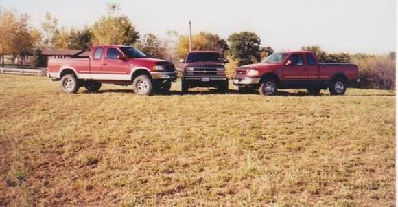 On the far left before build. Had 5" lift and 35's. Truck on the far right is next, getting 54" Boggers.