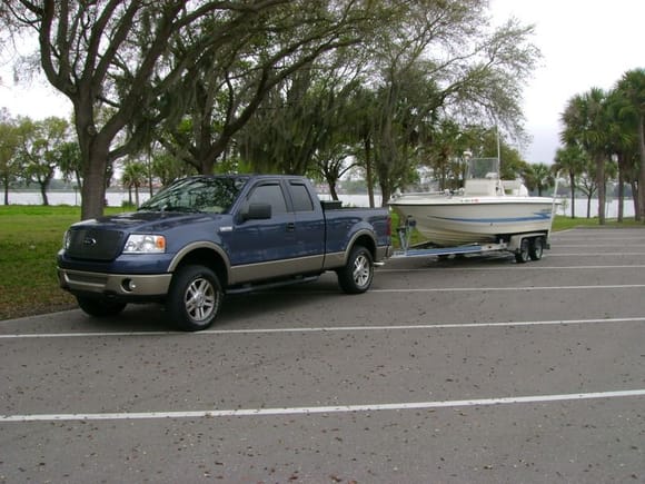 Truck and boat at park