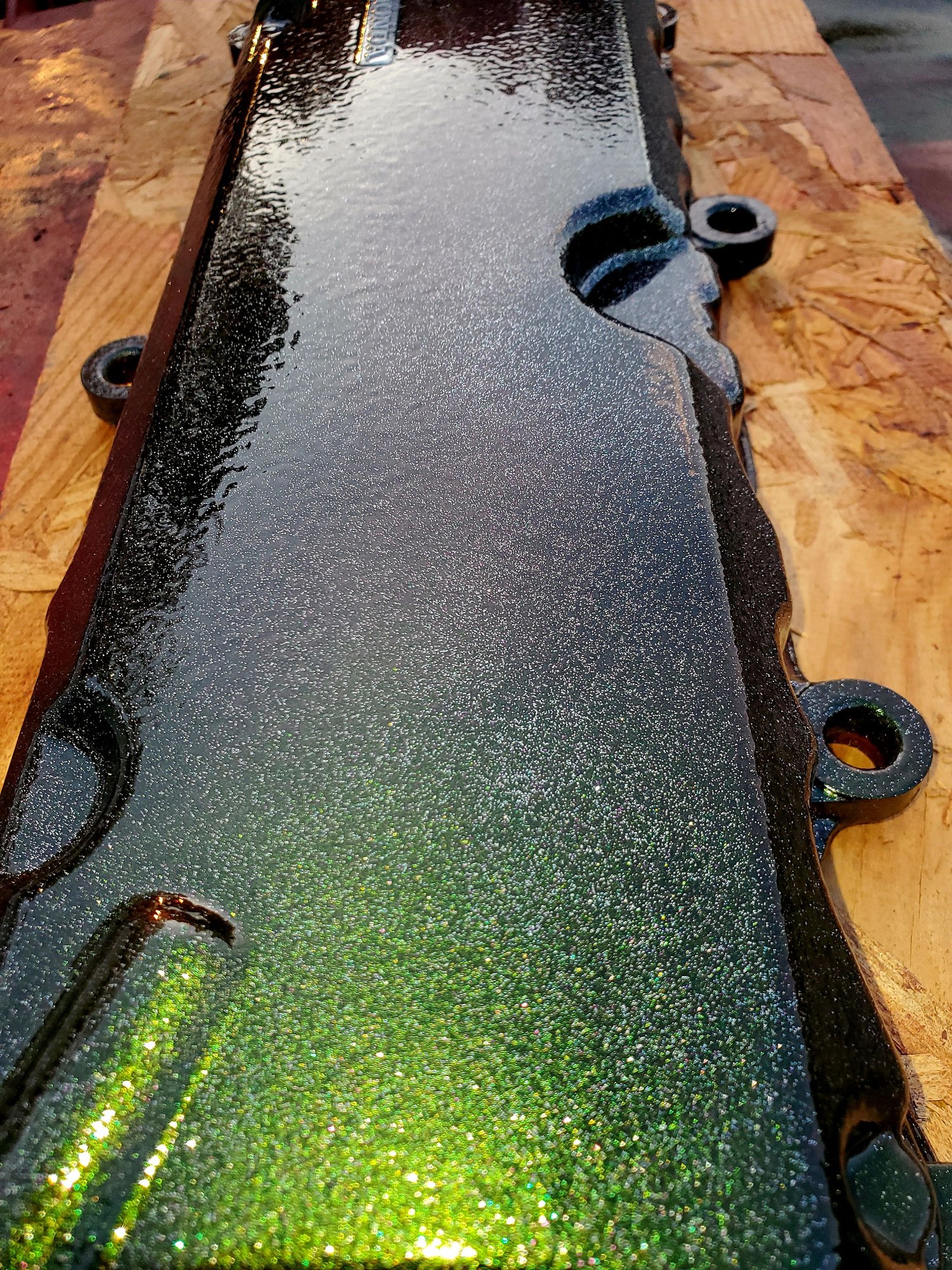Painted the valve cover, next changing the engine cover from orange to green. 