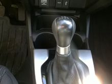 Very small scratches on silver-colored trim by shifter