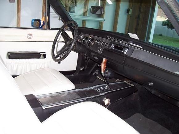 Ol' Blu's interior with a pistol grip A/T