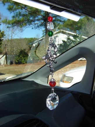 Hanging from rear view mirror &amp; bought at Hallmark last year.