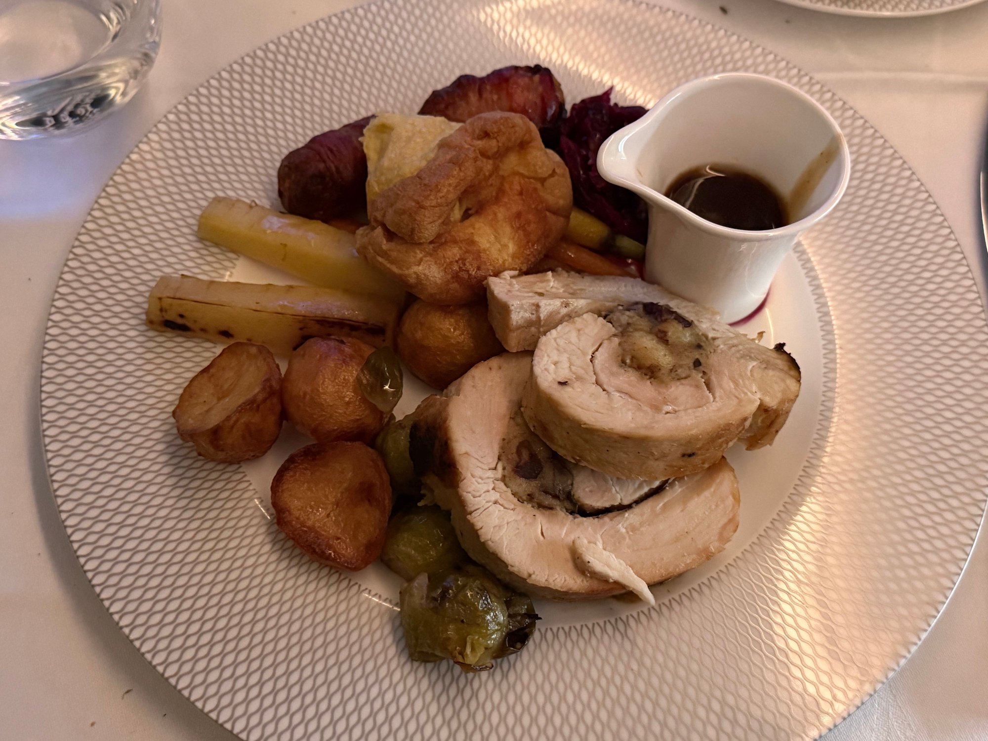 Christmas dinner was great. Turkey was slightly drier than the similar dish on SEA to LHR, but all the sides were better. 