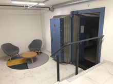 Basement room holding an authentic safe