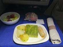 Pre-arrival breakfast. The green thing tasted of mega salt with maybe pesto? Little muffin in the wrapper there. Glad I had time for PL breakfast (and shower!)