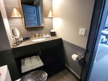Toilet & Sink, note toilet paper palcement and "worn" toilet seat.