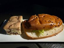 This was the midflight snack. A sandwich and cake.  Both very dry and hardly anything on the sandwich.  I would skip this next time. If DO&CO catering did this, it fails.  