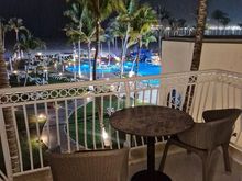 Balcony with the pool view (and sea)