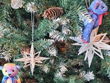 The  small christmas tree in the dining room had the Conrad bears attached ( a pride one to the left and the holiday one on the right ( this one is also given out free in your room on arrival)