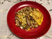 Korubuta pork ( leftover ) egg fried rice with corn and long beans ; Chye Poh ( pickled radish ) omelette 