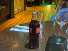 We laughed at the small coke 